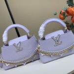 CAPUCINES EAST-WEST BB Handbag M2A379, Purple / Enamel (Macaron)