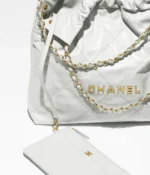 CHANEL / CHANEL 22 HANDBAG Shiny Calfskin & Gold-Tone Metal Light Blue - Image 3
