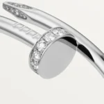 Cartier / JUSTE UN CLOU BRACELET Juste un Clou bracelet, classic, 18K white gold (750/1000), set with 32 brilliant-cut diamonds totaling 0.58 carat. Width: 3.5 mm (for size 17). - Image 9