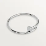 Cartier / JUSTE UN CLOU BRACELET Juste un Clou bracelet, classic, 18K white gold (750/1000), set with 32 brilliant-cut diamonds totaling 0.58 carat. Width: 3.5 mm (for size 17).