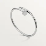 Cartier / JUSTE UN CLOU BRACELET Juste un Clou bracelet, classic, 18K white gold (750/1000), set with 32 brilliant-cut diamonds totaling 0.58 carat. Width: 3.5 mm (for size 17). - Image 4