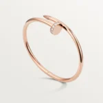 Cartier / JUSTE UN CLOU BRACELET Juste un Clou bracelet, classic, 18K rose gold (750/1000), set with 32 brilliant-cut diamonds totaling 0.58 carat. Width: 3.5 mm (for size 17). - Image 3
