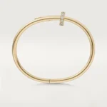 Cartier / JUSTE UN CLOU BRACELET Juste un Clou bracelet, classic, 18K yellow gold (750/1000), set with 32 brilliant-cut diamonds totaling 0.58 carat. Width: 3.5 mm (for size 17). - Image 5
