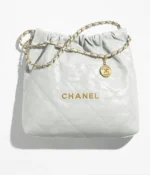 CHANEL / CHANEL 22 HANDBAG Shiny Calfskin & Gold-Tone Metal Light Blue