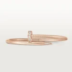 Cartier / JUSTE UN CLOU BRACELET Juste un Clou bracelet, classic, 18K rose gold (750/1000), set with 32 brilliant-cut diamonds totaling 0.58 carat. Width: 3.5 mm (for size 17). - Image 6