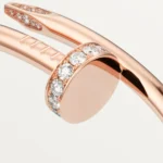 Cartier / JUSTE UN CLOU BRACELET Juste un Clou bracelet, classic, 18K rose gold (750/1000), set with 32 brilliant-cut diamonds totaling 0.58 carat. Width: 3.5 mm (for size 17). - Image 8