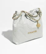 CHANEL / CHANEL 22 HANDBAG Shiny Calfskin & Gold-Tone Metal Light Blue - Image 2